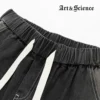 Close-up detail of the adjustable drawstring and elastic waistband on Art and Science premium dark grey trousers, showcasing quality stitching and durable materials.