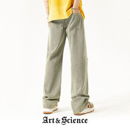 Close-up of the vintage light blue wash and fabric texture on Art and Science denim jeans, demonstrating the high-quality materials used in their construction.